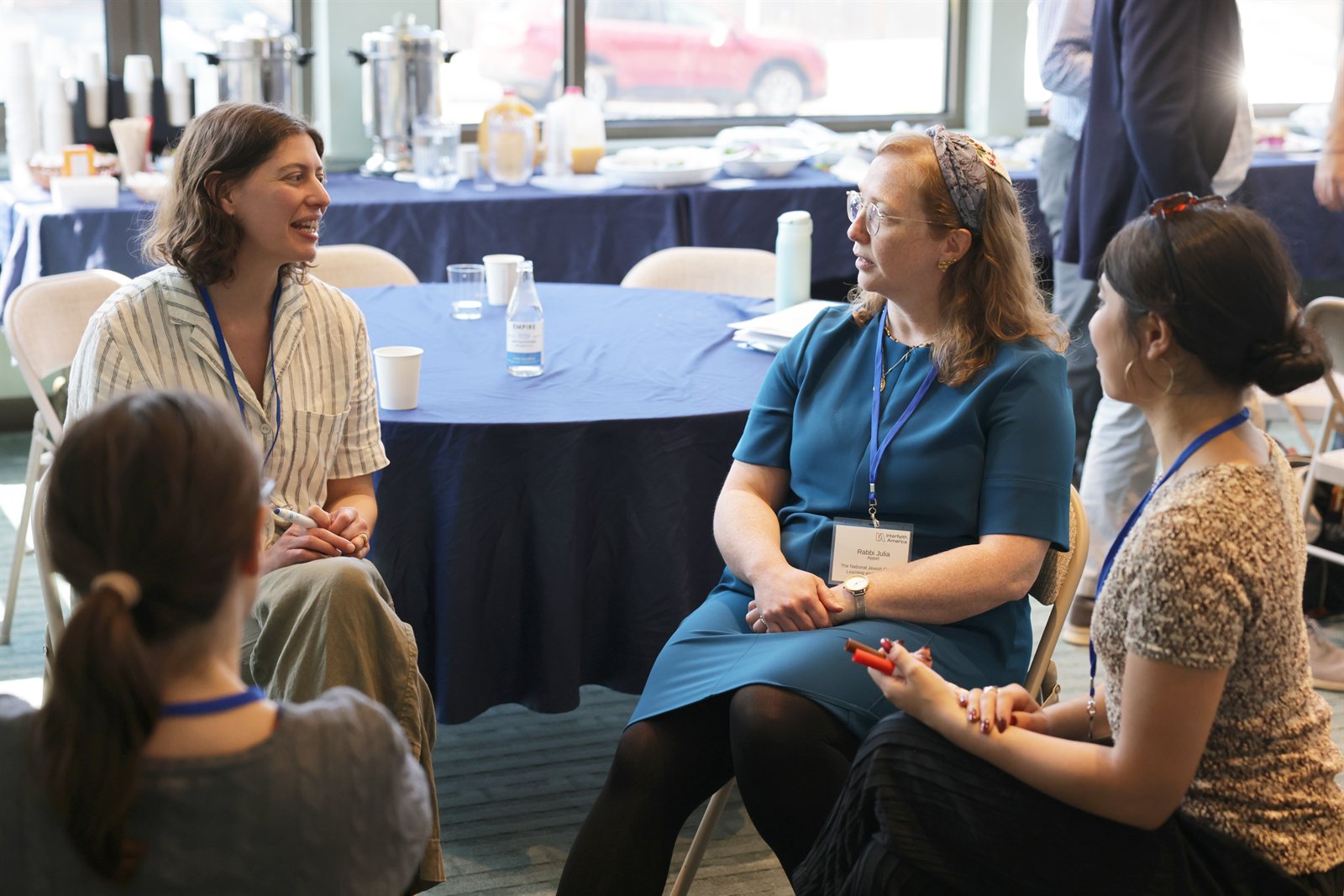 Clal leadership speaking at an event